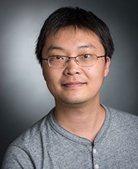 Dr. Wei Li posing for a portrait